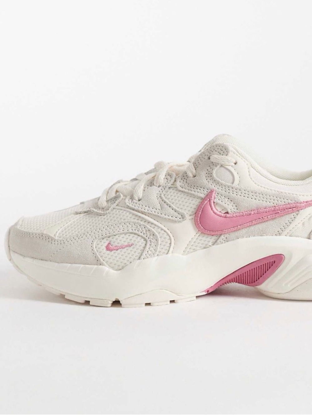 Nike Women’s Cream Sneakers with Pink Swoosh AL8